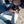 Load image into Gallery viewer, MiniCat Guppy being inflated on the beach
