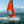 Load image into Gallery viewer, Red MiniCat 310 Sport being sailed fast
