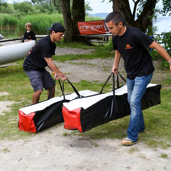MiniCat 310 being carried in a single bag